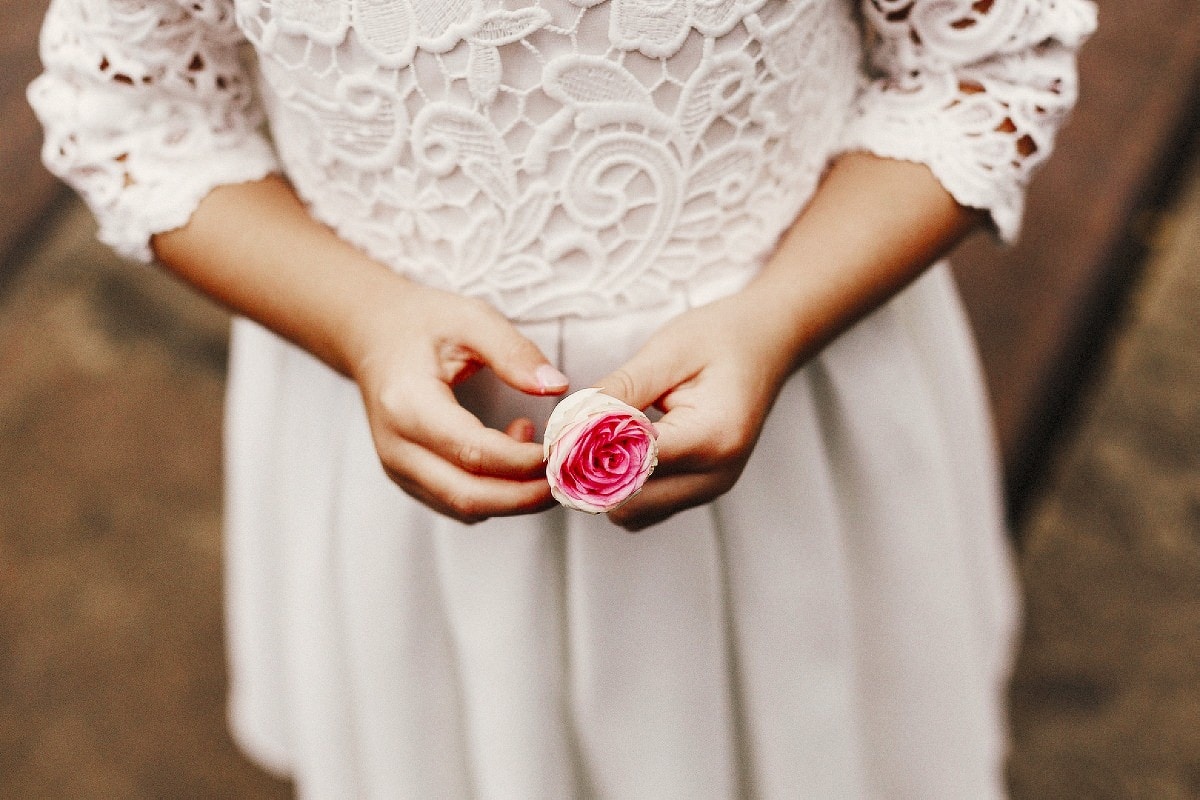 Flowergirl with pink rose